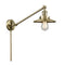 Railroad Swing Arm shown in the Antique Brass finish with a Antique Brass shade