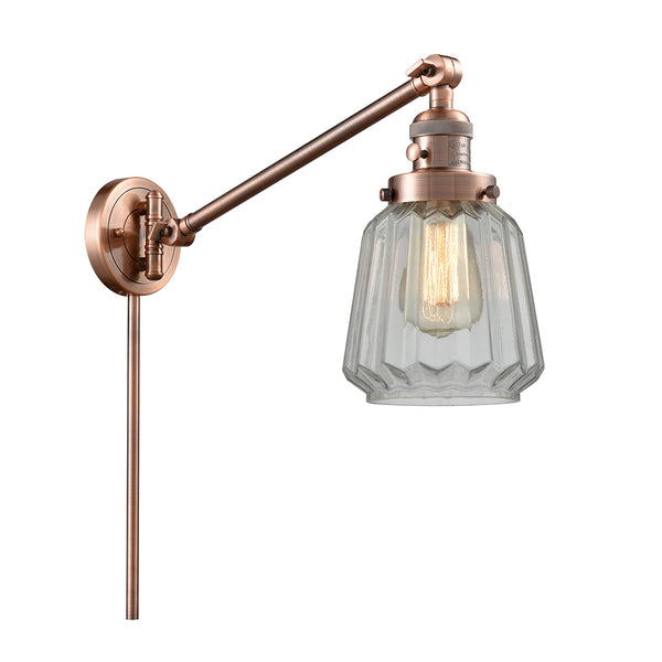 Chatham Swing Arm shown in the Antique Copper finish with a Clear shade