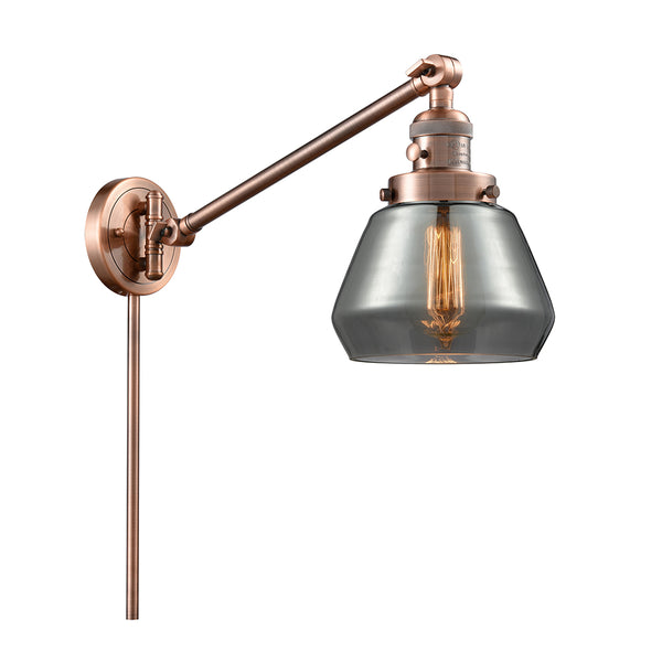 Fulton Swing Arm shown in the Antique Copper finish with a Plated Smoke shade