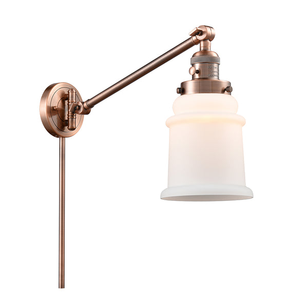 Canton Swing Arm shown in the Antique Copper finish with a Matte White shade