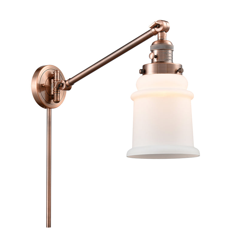 Canton Swing Arm shown in the Antique Copper finish with a Matte White shade
