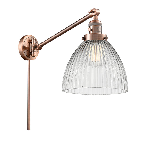 Seneca Falls Swing Arm shown in the Antique Copper finish with a Clear Halophane shade