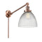 Seneca Falls Swing Arm shown in the Antique Copper finish with a Clear Halophane shade