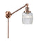 Colton Swing Arm shown in the Antique Copper finish with a Clear Halophane shade