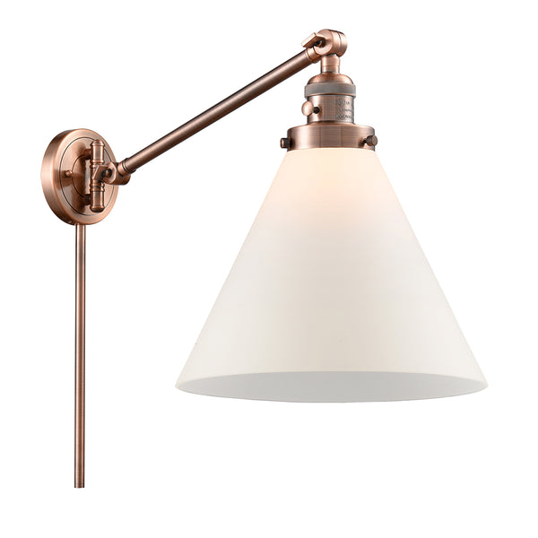 Cone Swing Arm shown in the Antique Copper finish with a Matte White shade