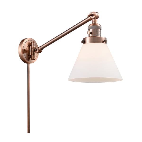 Cone Swing Arm shown in the Antique Copper finish with a Matte White shade
