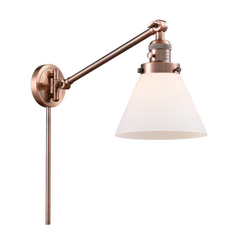 Cone Swing Arm shown in the Antique Copper finish with a Matte White shade