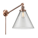 Cone Swing Arm shown in the Antique Copper finish with a Clear shade
