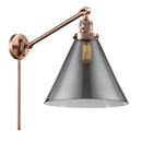 Cone Swing Arm shown in the Antique Copper finish with a Plated Smoke shade