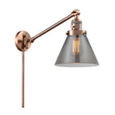 Cone Swing Arm shown in the Antique Copper finish with a Plated Smoke shade
