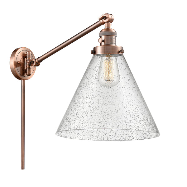 Cone Swing Arm shown in the Antique Copper finish with a Seedy shade