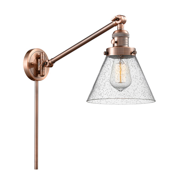 Cone Swing Arm shown in the Antique Copper finish with a Seedy shade