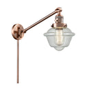 Oxford Swing Arm shown in the Antique Copper finish with a Seedy shade