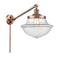 Oxford Swing Arm shown in the Antique Copper finish with a Clear shade