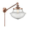 Oxford Swing Arm shown in the Antique Copper finish with a Seedy shade