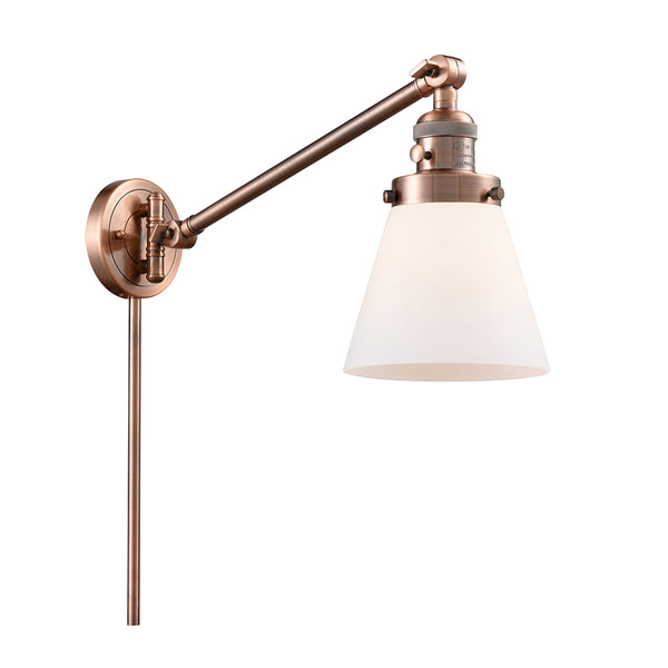 Cone Swing Arm shown in the Antique Copper finish with a Matte White shade