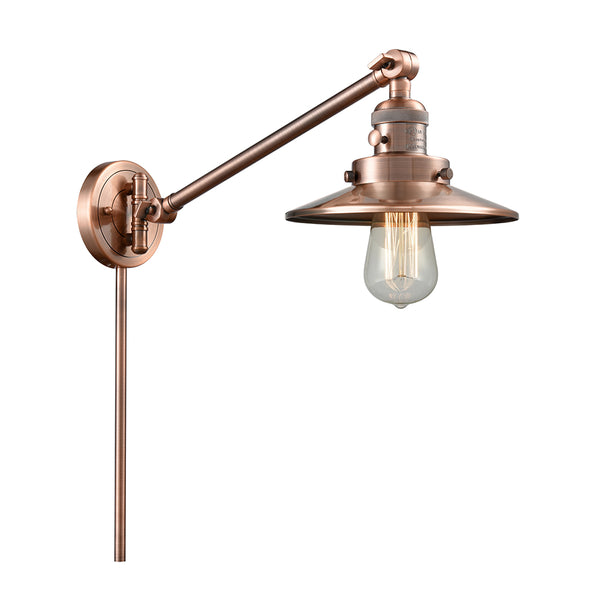 Railroad Swing Arm shown in the Antique Copper finish with a Antique Copper shade