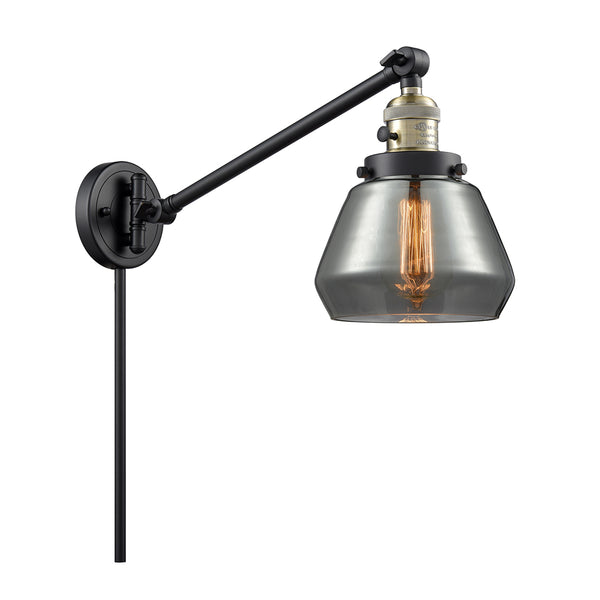 Fulton Swing Arm shown in the Black Antique Brass finish with a Plated Smoke shade