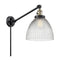 Seneca Falls Swing Arm shown in the Black Antique Brass finish with a Clear Halophane shade