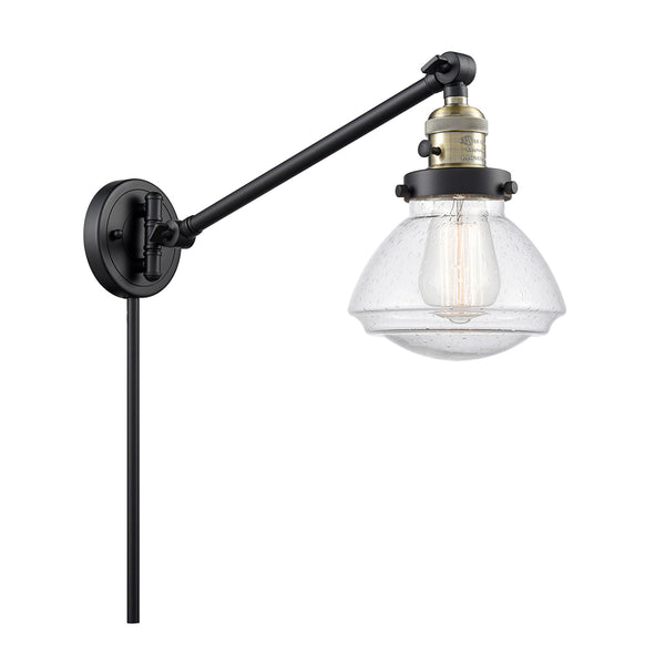 Olean Swing Arm shown in the Black Antique Brass finish with a Seedy shade