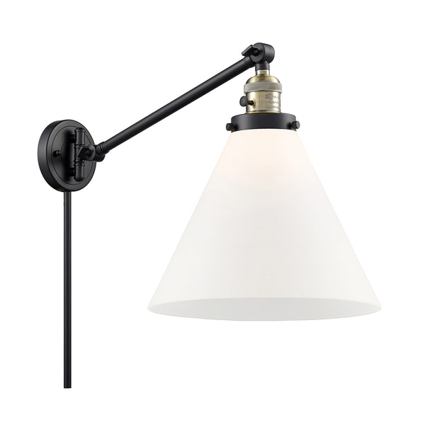 Cone Swing Arm shown in the Black Antique Brass finish with a Matte White shade