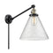 Cone Swing Arm shown in the Black Antique Brass finish with a Seedy shade