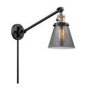 Cone Swing Arm shown in the Black Antique Brass finish with a Plated Smoke shade