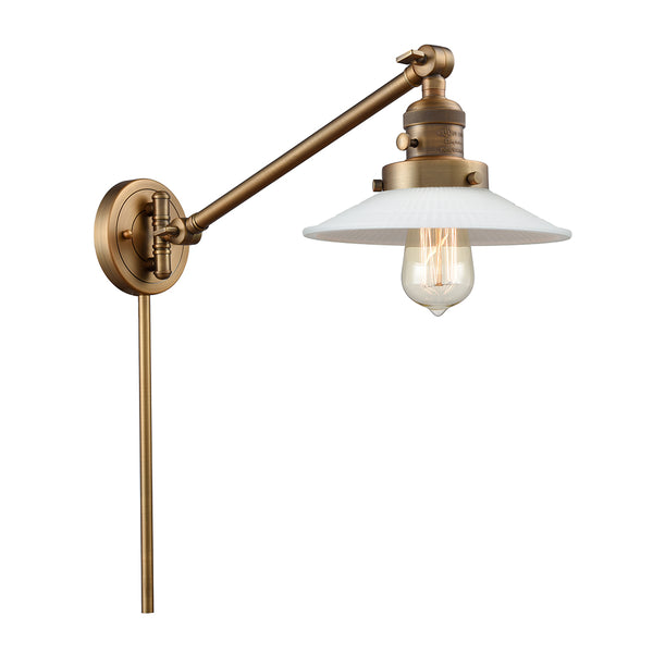 Halophane Swing Arm shown in the Brushed Brass finish with a Matte White Halophane shade