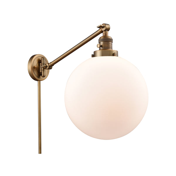 Beacon Swing Arm shown in the Brushed Brass finish with a Matte White shade