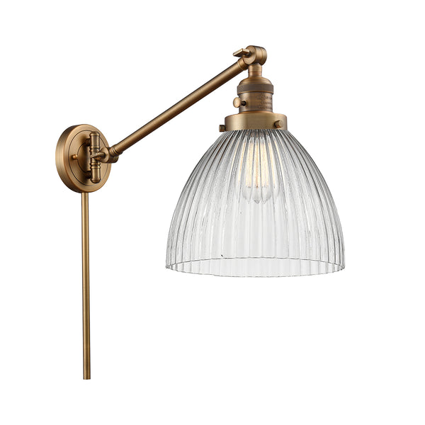 Seneca Falls Swing Arm shown in the Brushed Brass finish with a Clear Halophane shade