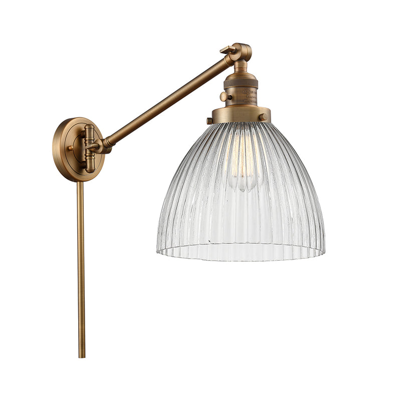 Seneca Falls Swing Arm shown in the Brushed Brass finish with a Clear Halophane shade