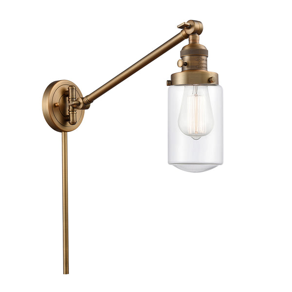 Dover Swing Arm shown in the Brushed Brass finish with a Clear shade