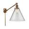 Cone Swing Arm shown in the Brushed Brass finish with a Clear shade
