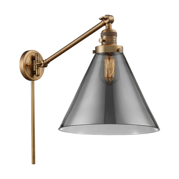 Cone Swing Arm shown in the Brushed Brass finish with a Plated Smoke shade