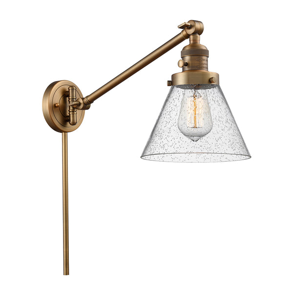 Cone Swing Arm shown in the Brushed Brass finish with a Seedy shade