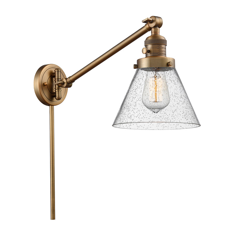 Cone Swing Arm shown in the Brushed Brass finish with a Seedy shade