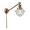 Oxford Swing Arm shown in the Brushed Brass finish with a Seedy shade