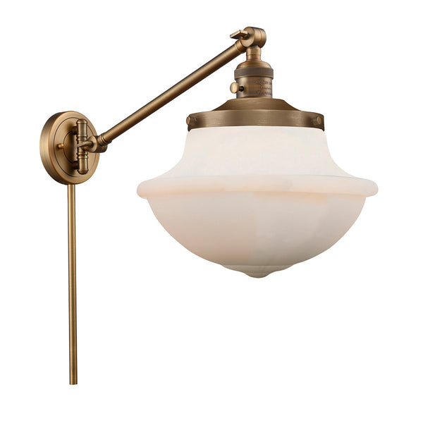 Oxford Swing Arm shown in the Brushed Brass finish with a Matte White shade