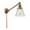 Cone Swing Arm shown in the Brushed Brass finish with a Clear shade