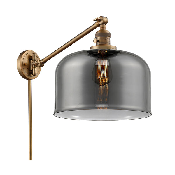 Bell Swing Arm shown in the Brushed Brass finish with a Plated Smoke shade