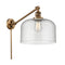 Bell Swing Arm shown in the Brushed Brass finish with a Seedy shade