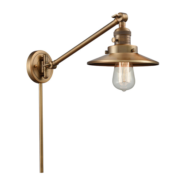 Railroad Swing Arm shown in the Brushed Brass finish with a Brushed Brass shade