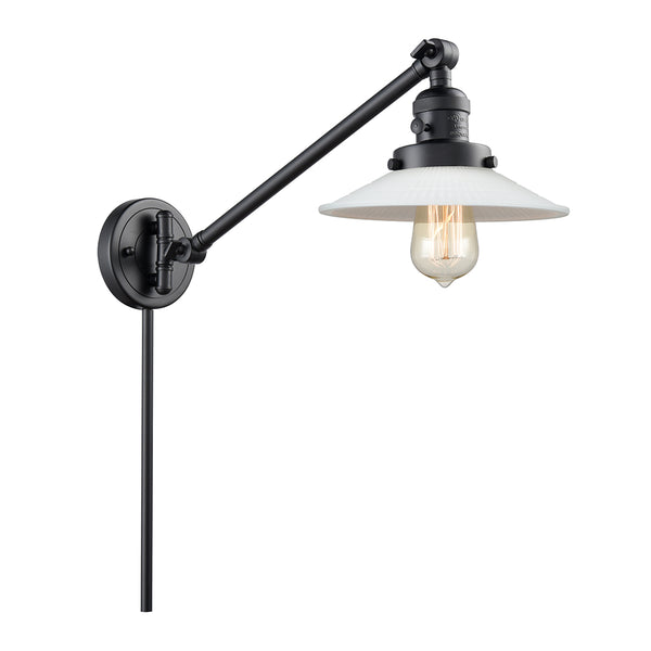 Halophane Swing Arm shown in the Matte Black finish with a Matte White Halophane shade