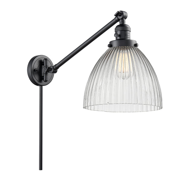 Seneca Falls Swing Arm shown in the Matte Black finish with a Clear Halophane shade