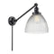 Seneca Falls Swing Arm shown in the Matte Black finish with a Clear Halophane shade