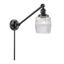 Colton Swing Arm shown in the Matte Black finish with a Clear Halophane shade