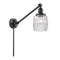 Colton Swing Arm shown in the Matte Black finish with a Clear Halophane shade