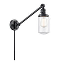 Dover Swing Arm shown in the Matte Black finish with a Clear shade