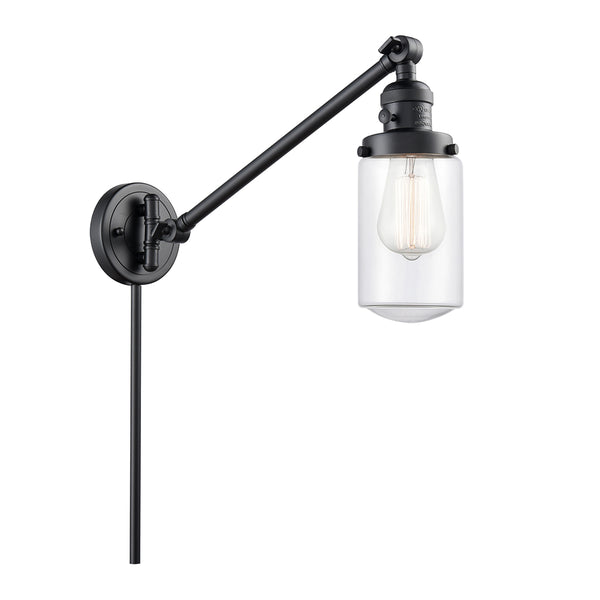 Dover Swing Arm shown in the Matte Black finish with a Clear shade