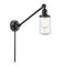 Dover Swing Arm shown in the Matte Black finish with a Seedy shade